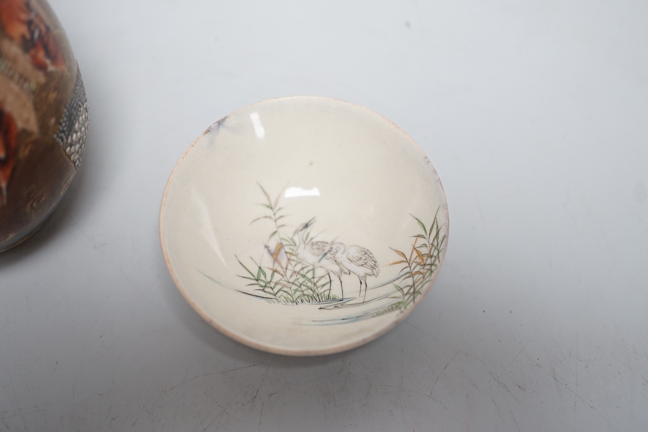 A small Japanese Satsuma pottery dish by Kinkozan and a Satsuma ‘rakan’ Vase, 13cm